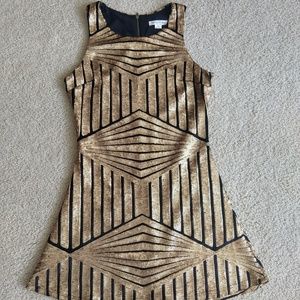Gold sequined mini cockail dress